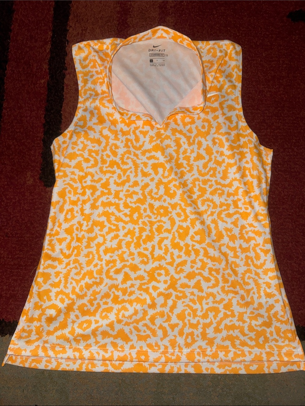 Nike Women's Dri-FIT sleeveless golf polo